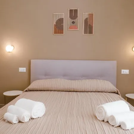 Guesthost - Maison Vittoria Comfortable Apartment&room Couette-café